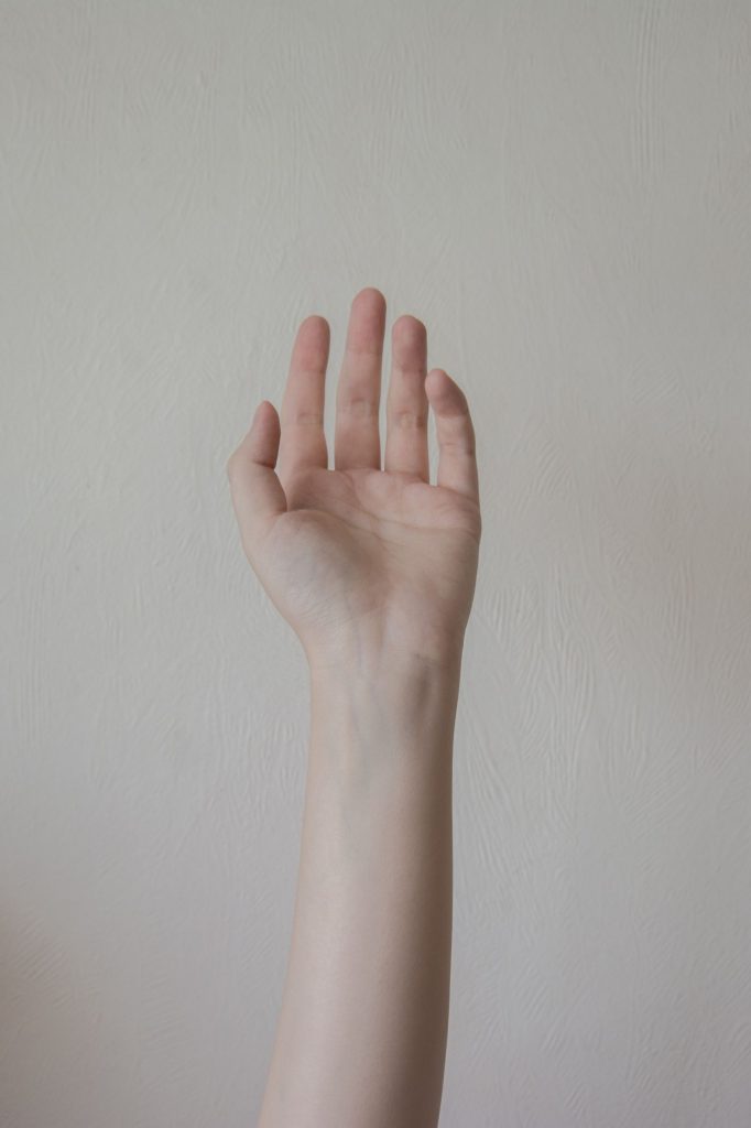 An-open-hand-palm-turned-upward-relaxed