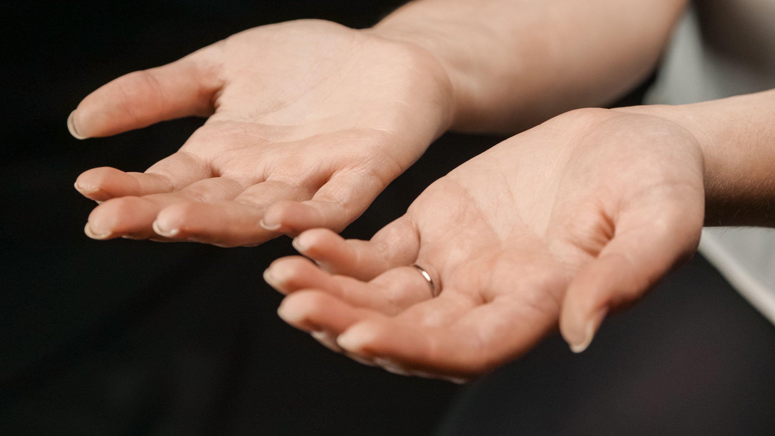 Open-empty-hands-held-out-with-palms-up
