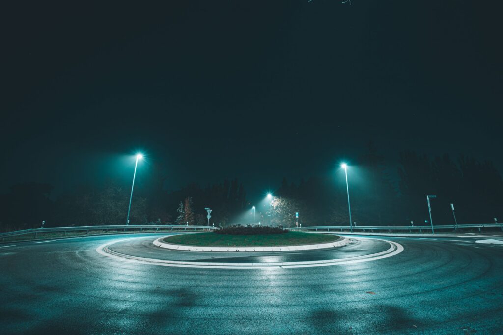 streetlight-circle-empty-pavement-night