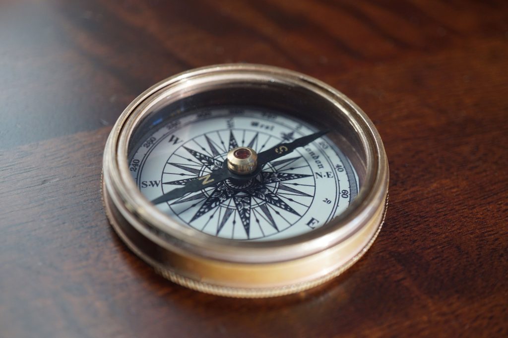 old-brass-compass-needle-settled-at-north