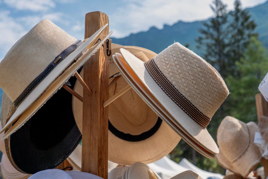 Old-wooden-hat-stand-holding-several-different-hats