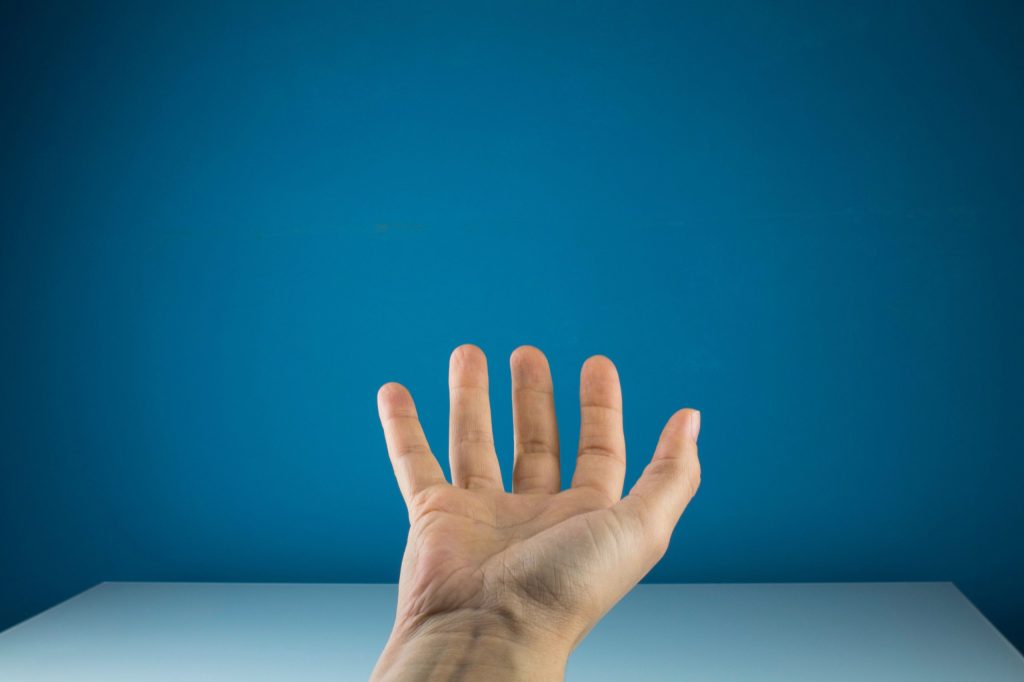 open-hand-held-out-flat-with-nothing-in-it